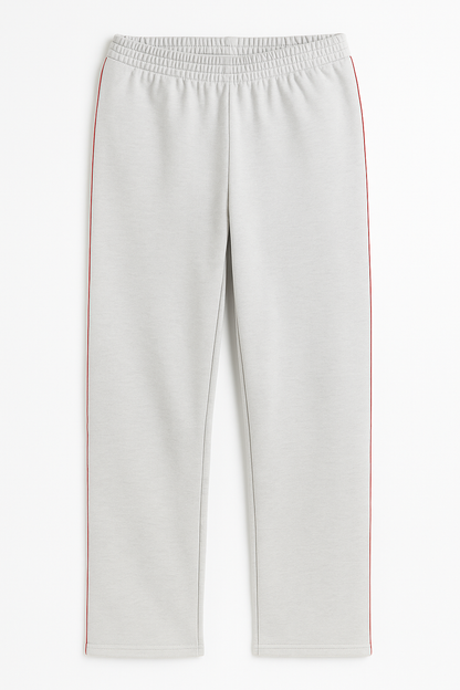 Damen Trainingshose in Cremeweiß mit rotem Seitenstreifen