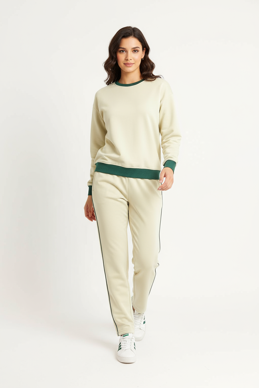 Damen Trainingshose in Beige mit grünem Seitenstreifen