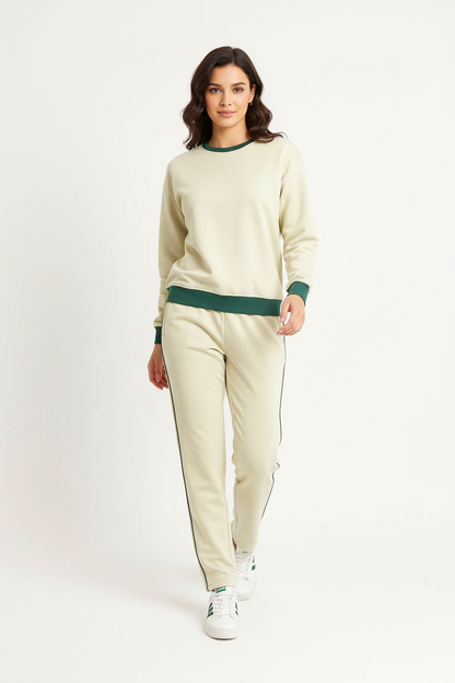 Damen Trainingshose in Beige mit grünem Seitenstreifen