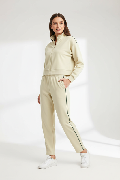 Damen Trainingshose in Beige mit grünem Seitenstreifen